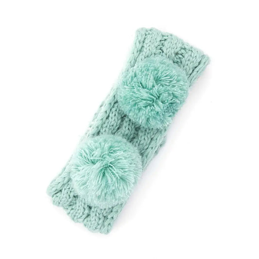 C.C Double Pom Kids Head Wrap With Fuzzy Lining in Mint blue  These super cozy + warm head wraps are our kid's favorites! With two faux fur pom-poms giving your kids/grandkids a cute look while keeping their ears warm! These will sell out - get them as soon as you can while they are in stock!