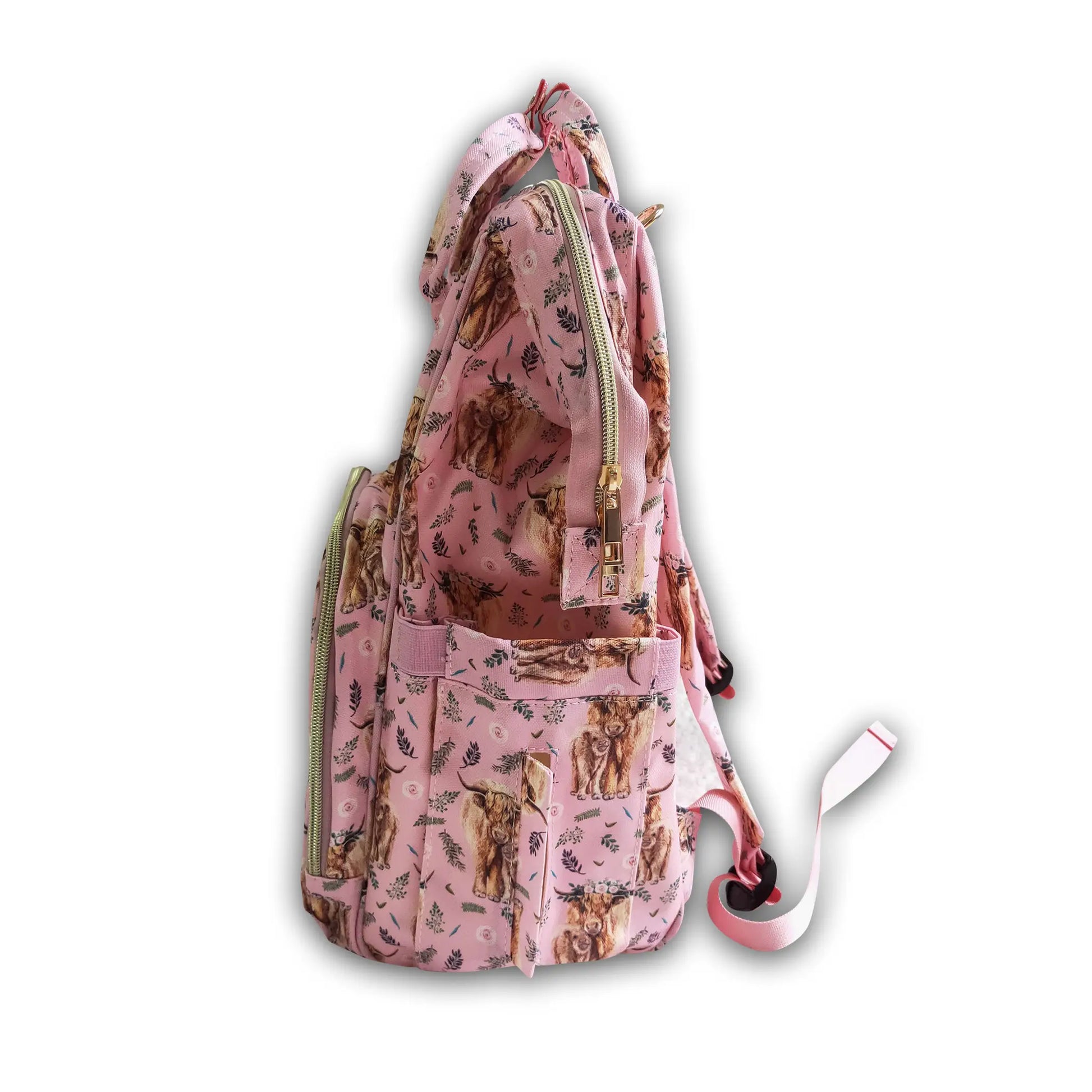 Wildflowers + cows baby diaper or backpack-  ﻿Stay stylish with this beautiful cowgirl style bag!   Perfect to use as a diaper bag with compartments to keep diapers, pacifiers, burp cloths, spare clothes, bottles + so much more!  Or use it as a stunning kids school backpack!  Size:  15.75 inches x 10.24inches