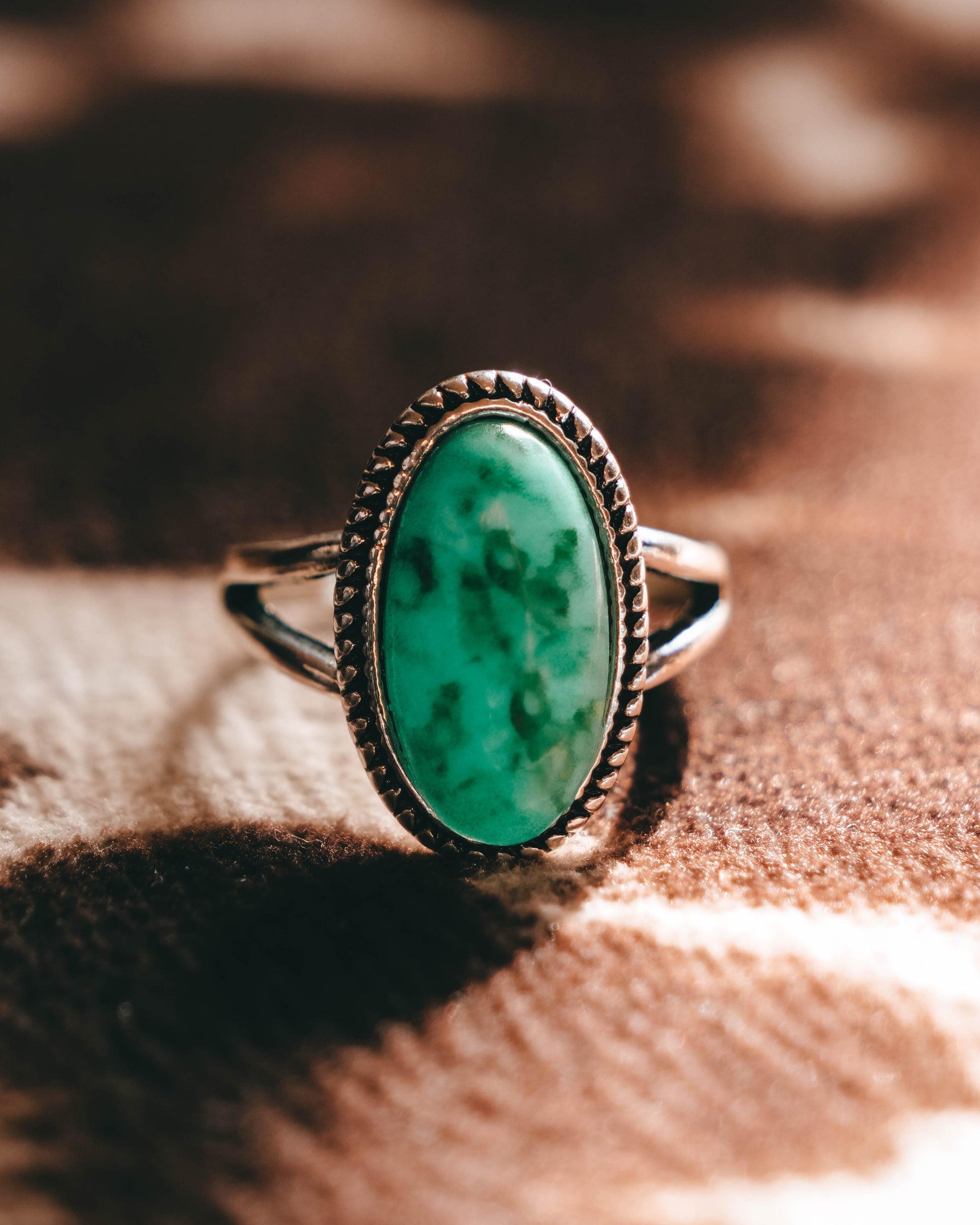 Turquoise oval western-style jewelry- This gorgeous cowgirl-style ring has a turquoise colored gem-stone.