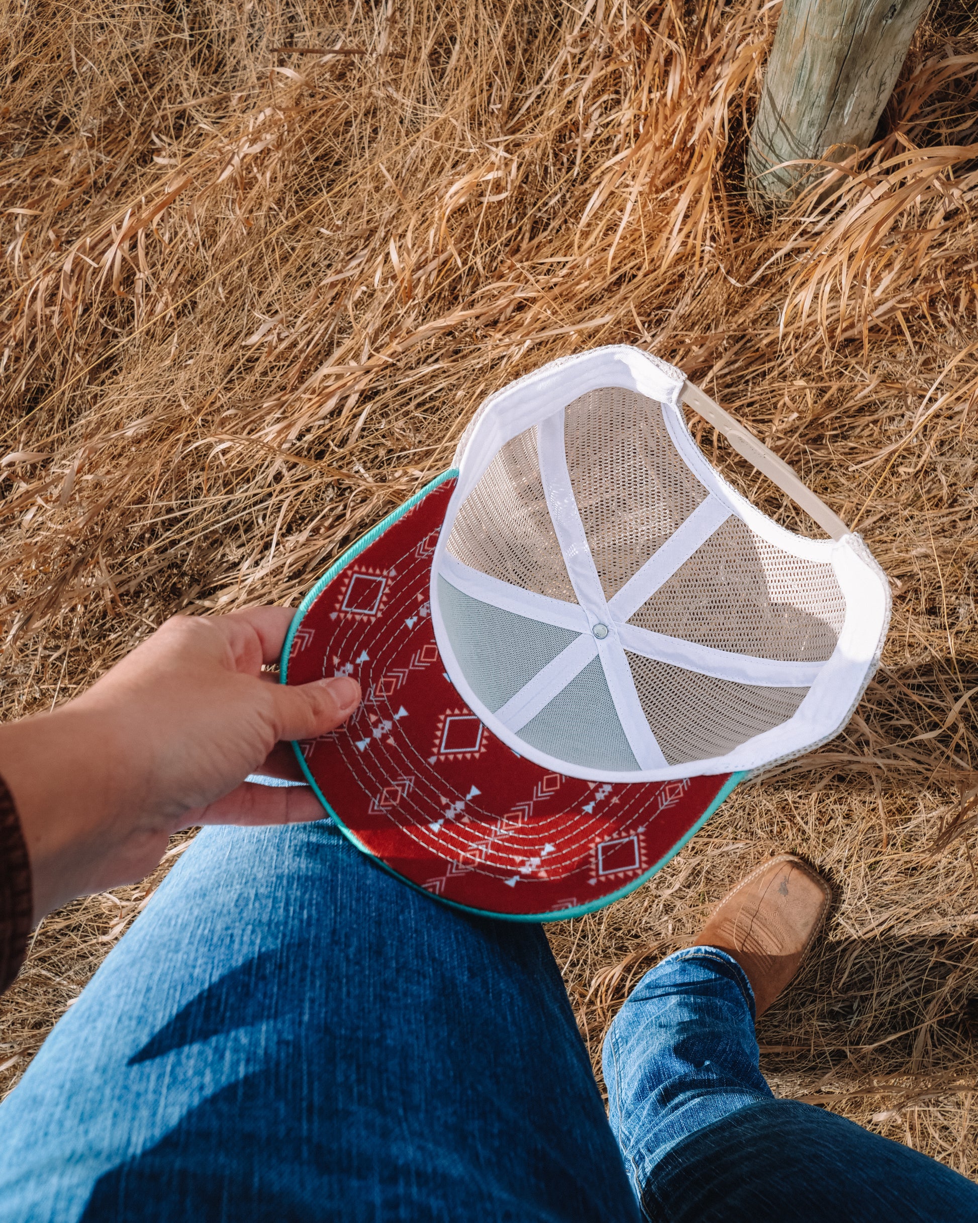 Out West ball cap in Aqua-  Our in-demand trucker caps are finally here + proudly designed by Out West! Not only fun & functional but truly a stylish staple piece for any rancher!  A gorgeous aqua color with a light cream mesh back & adjustable strap.