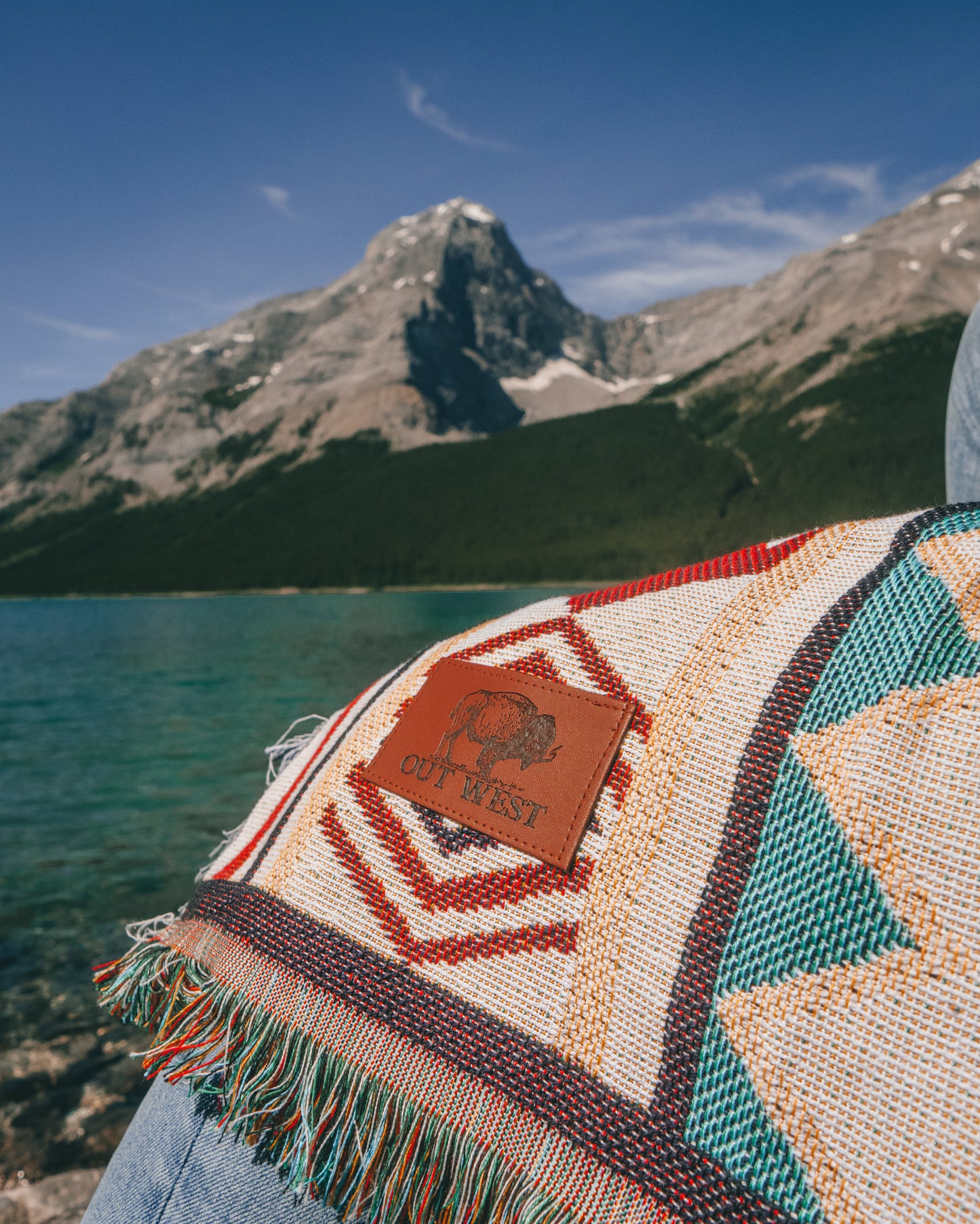 Aztec geometric western style throw rug- The perfect blanket for those cozy cold nights under the stars next to the campfire! Suited for every occasion from picnics, rodeos, camping, van life, yoga, and even beach trips! Or simply place it on your couch or bed for a splash of color to the room!  Color: White and earthy colors 