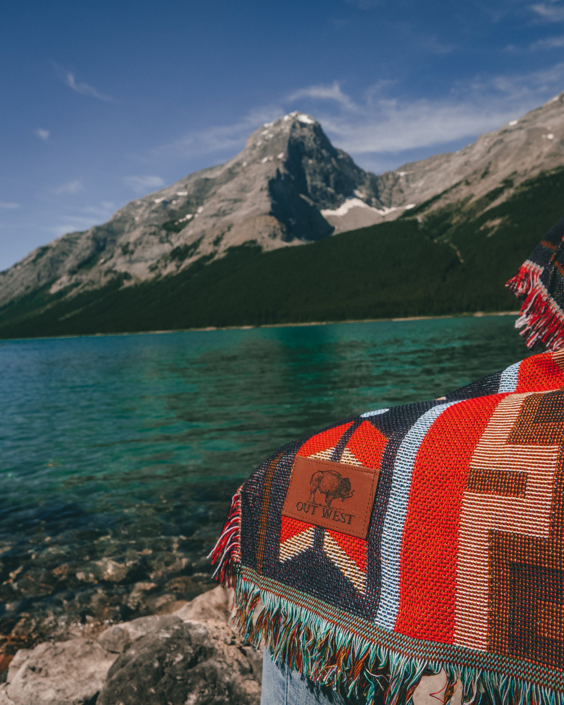 Aztec geometric western style throw rug- The perfect blanket for those cozy cold nights under the stars next to the campfire! Suited for every occasion from picnics, rodeos, camping, van life, yoga, and even beach trips! Or simply place it on your couch or bed for a splash of color to the room!  Color: Earthy brown and reds